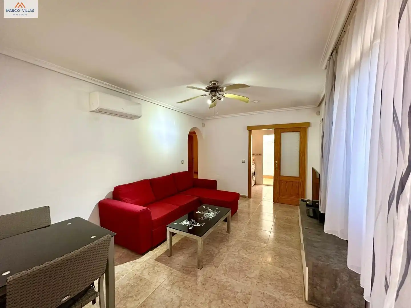 Sala d'estar de Planta baixa en venda en Orihuela amb Aire condicionat, Jardí privat i Piscina comunitària