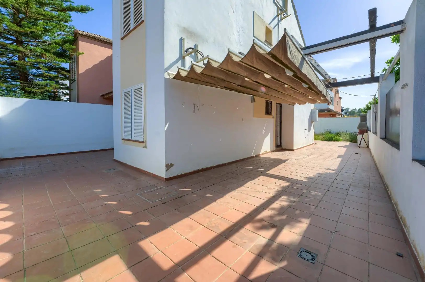 Exterior view of Houses for sale in Coria del Río  with Private garden and Terrace
