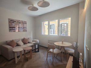 Sala d'estar de Apartament en venda en  Madrid Capital amb Aire condicionat, Calefacció i Moblat