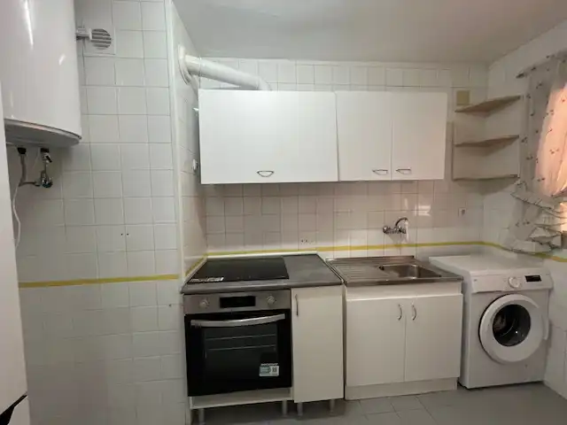 Cuina de Pis de lloguer en Puertollano amb Aire condicionat, Calefacció i Moblat