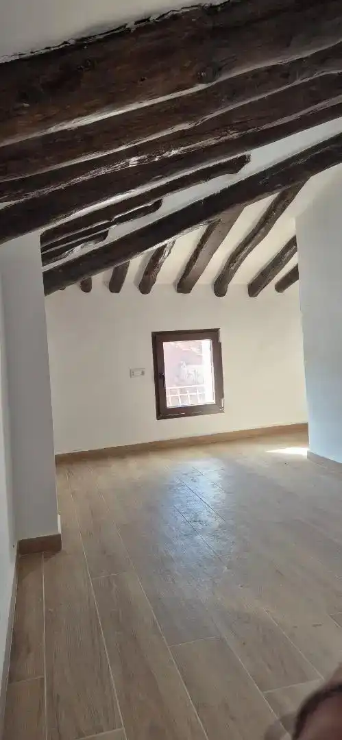 Sala d'estar de Casa adosada en venda en Aras de los Olmos