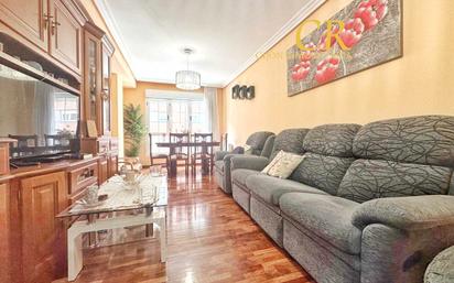 Living room of Flat for sale in Gijón   with Terrace, Storage room and Furnished