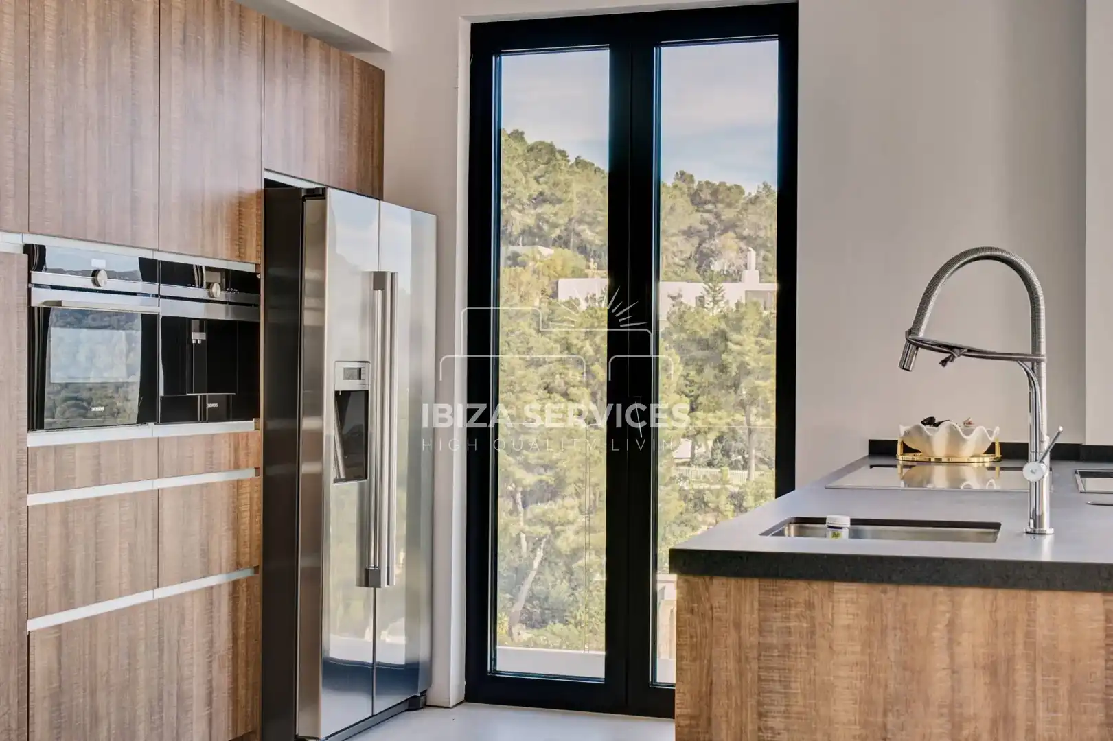 Cuina de Casa o xalet de lloguer en Santa Eulària des Riu amb Aire condicionat, Jardí privat i Piscina