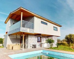 Vista exterior de Casa o xalet en venda en El Burgo de Ebro amb Aire condicionat, Calefacció i Jardí privat