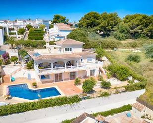 Vista exterior de Casa o xalet en venda en Moraira amb Jardí privat i Piscina comunitària