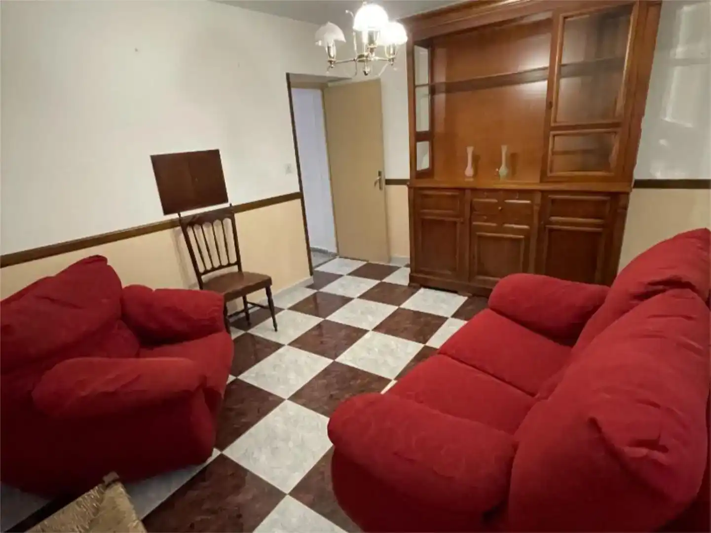 Sala d'estar de Casa adosada en venda en Alhama de Granada amb Balcó