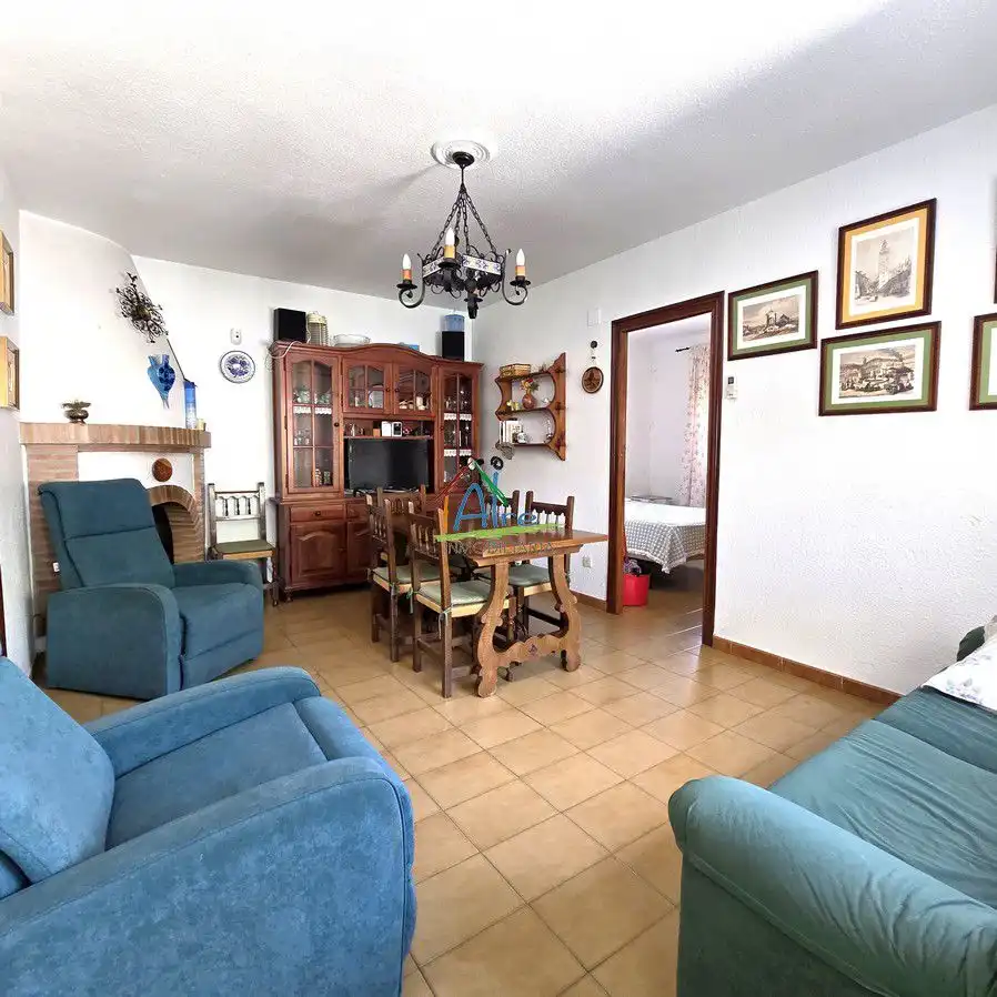 Sala de estar de Casa adosada en venta en Almonte con Aire acondicionado, Calefacción y Terraza