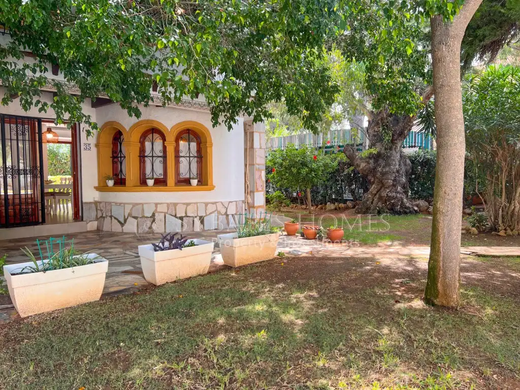 Garten von Einfamilien-Reihenhaus zum Verkauf in Dénia mit Klimaanlage und Gemeinschaftspool