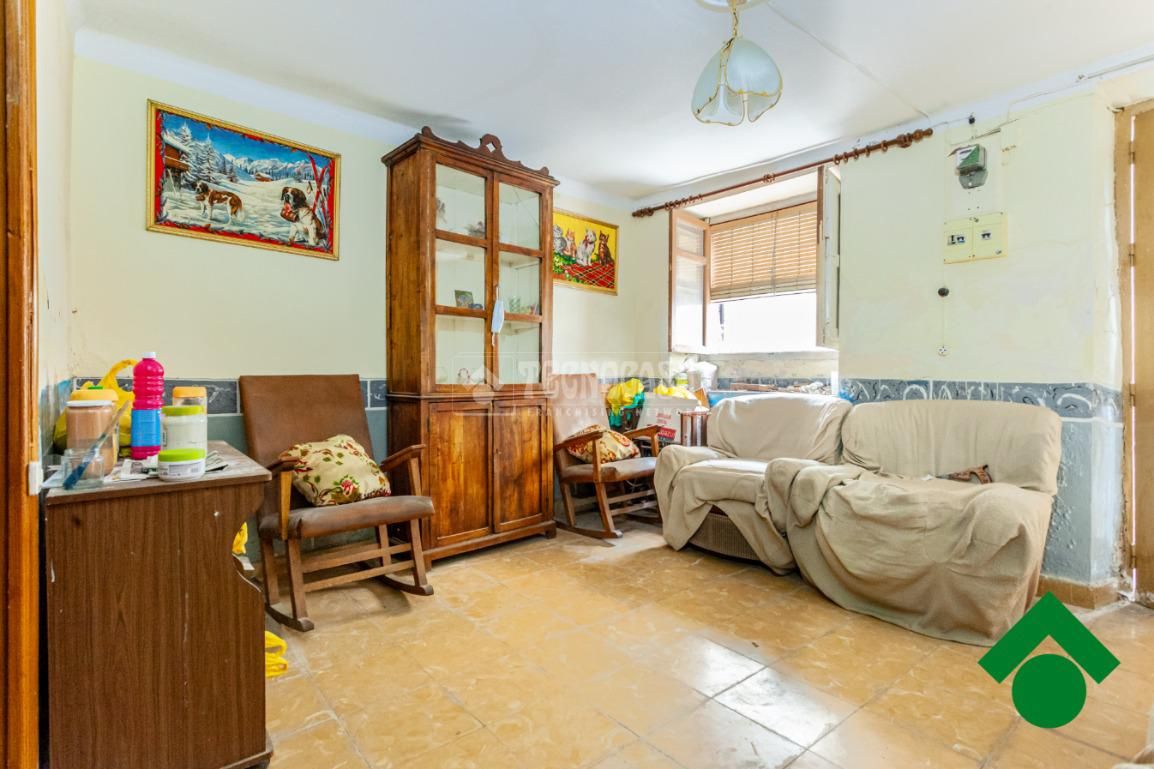 Sala d'estar de Casa adosada en venda en Pinos Puente