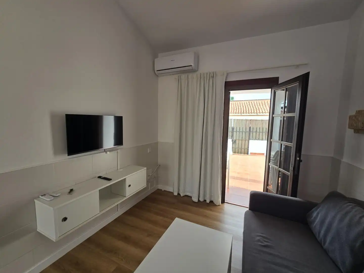 Sala d'estar de Casa o xalet de lloguer en San Bartolomé de Tirajana amb Aire condicionat, Terrassa i Moblat