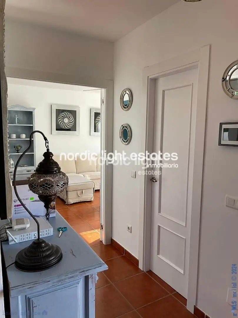 Sala de estar de Casa o chalet en venta en Nerja con Terraza y Piscina