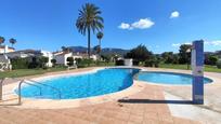 Piscina de Casa adosada en venda en Dénia amb Aire condicionat, Calefacció i Jardí privat