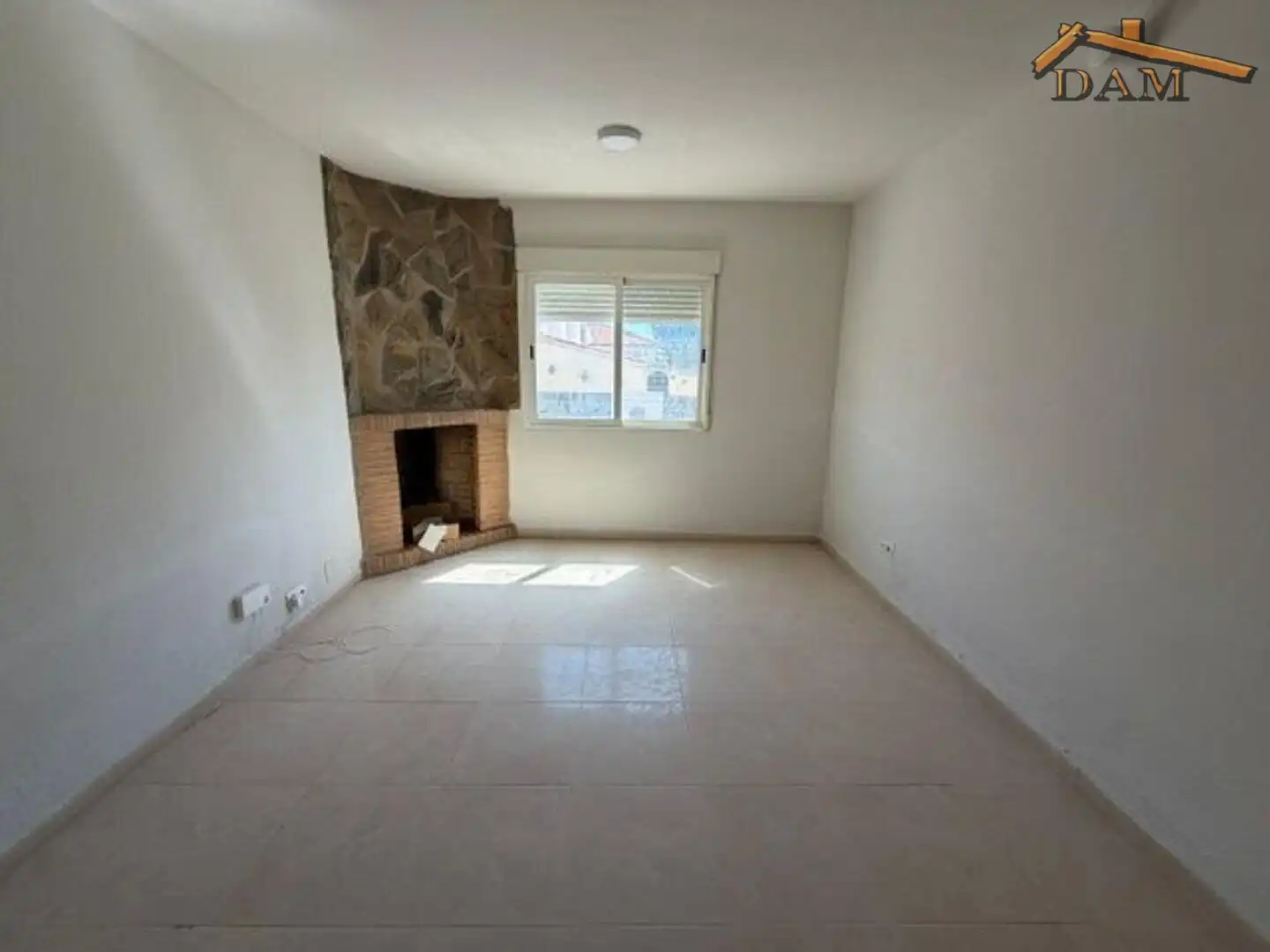 Sala de estar de Casa adosada en venta en Carmena