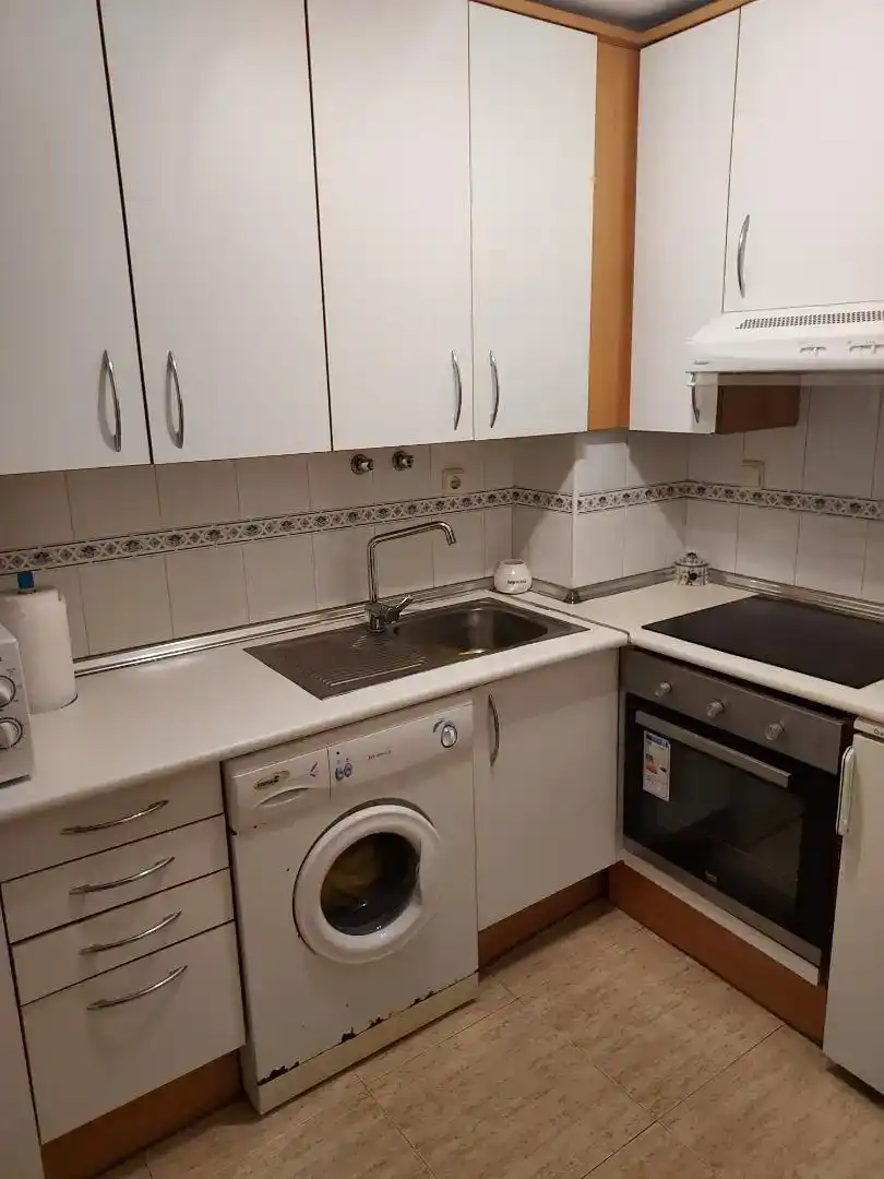 Cuina de Apartament de lloguer en Orihuela amb Aire condicionat, Piscina i Balcó