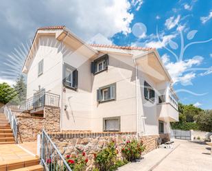 Exterior view of House or chalet for sale in Miraflores de la Sierra  with Private garden and Storage room