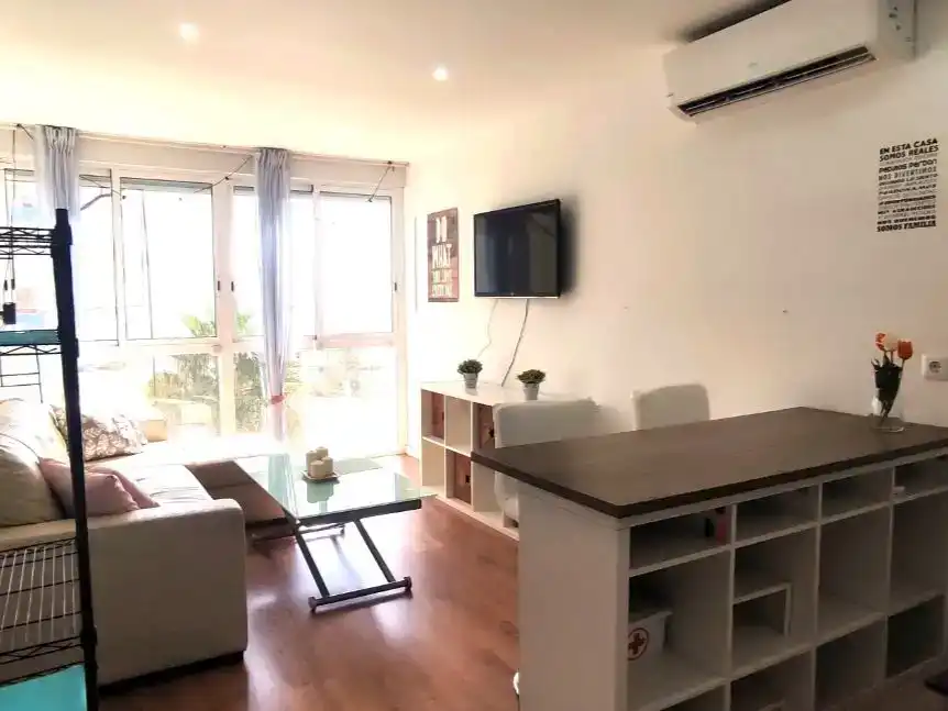 Sala d'estar de Pis de lloguer en Torremolinos amb Aire condicionat