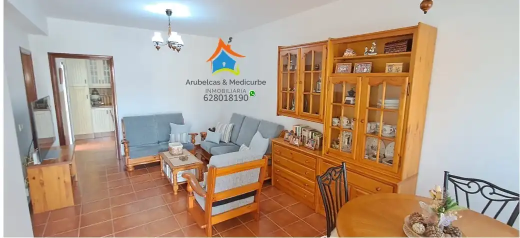 Wohnzimmer von Einfamilien-Reihenhaus zum Verkauf in Arucas mit Ofen, Mikrowelle und Balkon