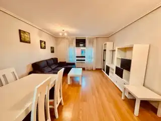 Sala de estar de Apartamento de alquiler en Villaquilambre con Calefacción, Parquet y Terraza