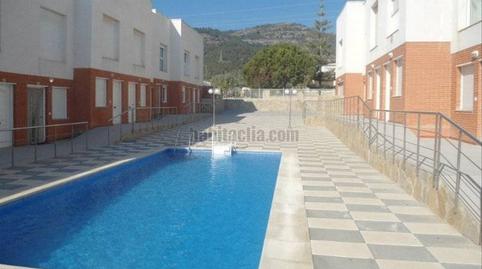 Foto 2 de Casa adosada en venda a Carrer Camp de Tir a, 5, Alcanar, Tarragona