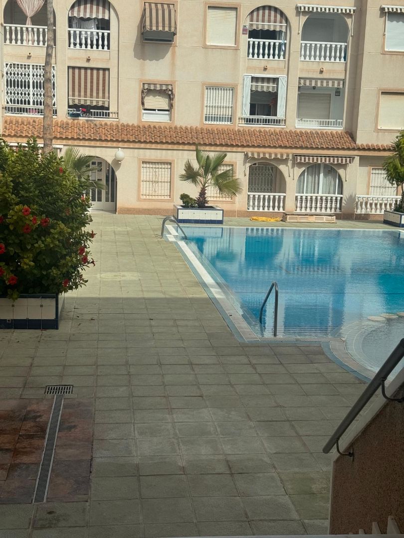 Swimming pool of Flat for sale in Torrevieja  with Furnished, Oven and Washing machine