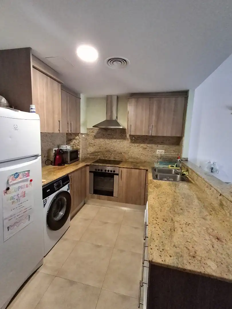 Kitchen of Flat for sale in L'Aldea  with Air Conditioner, Storage room and Furnished