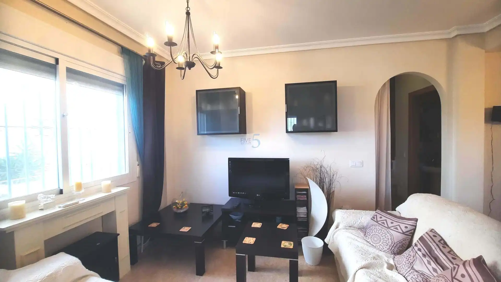 Sala de estar de Casa adosada en venta en Murcia con Aire acondicionado, Piscina y Amueblado