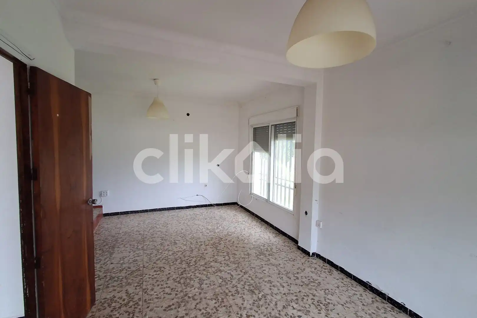 Sala d'estar de Casa o xalet en venda en Marchena amb Calefacció, Jardí privat i Piscina