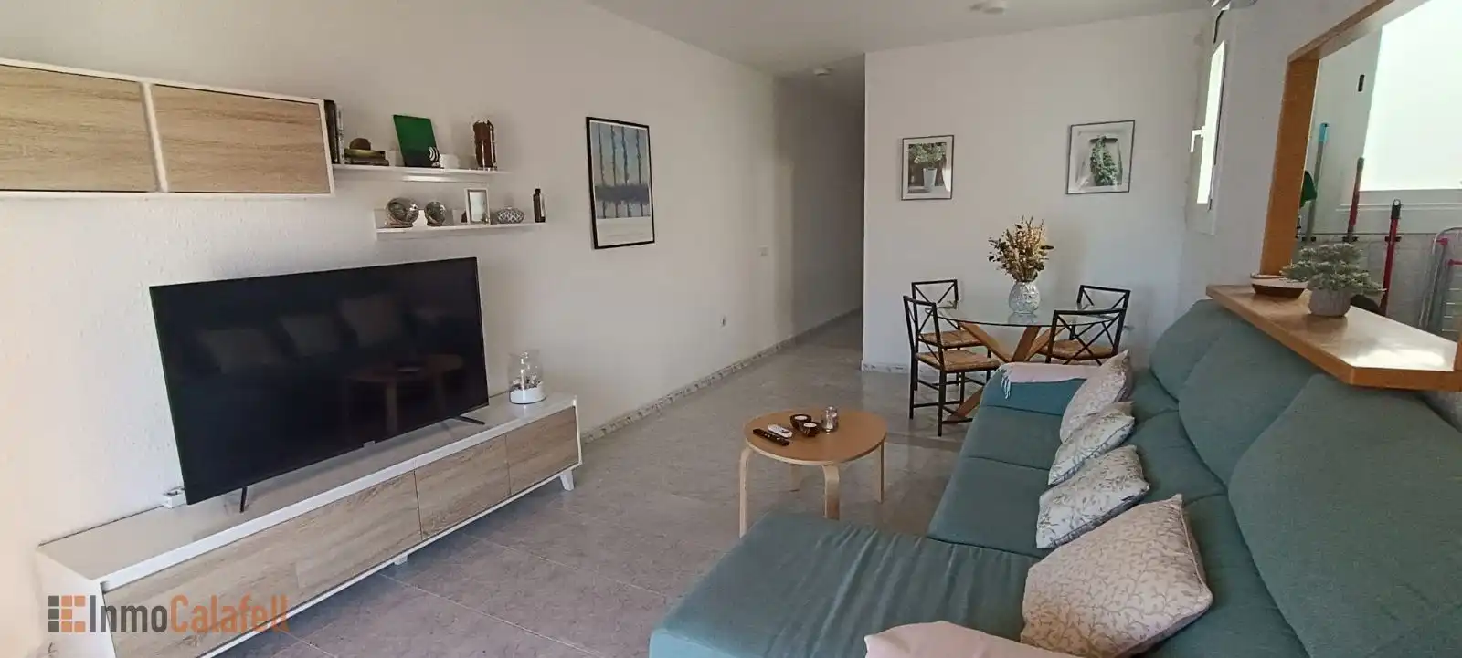 Wohnzimmer von Dachboden zum Verkauf in Calafell mit Klimaanlage, Heizung und Terrasse