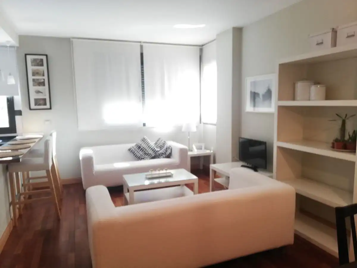 Sala d'estar de Pis de lloguer en Huelva amb Aire condicionat, Moblat i Piscina comunitària