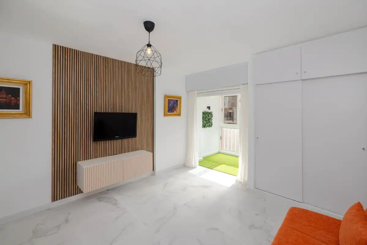 Sala de estar de Estudio en venta en Benalmádena con Calefacción, Jardín privado y Piscina