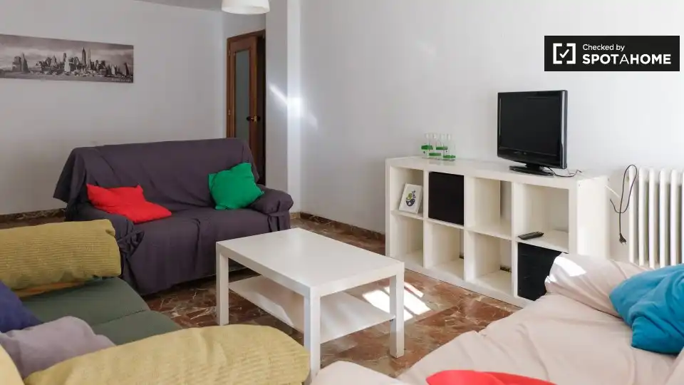 Sala d'estar de Apartament per a compartir en Granada amb Aire condicionat, Terrassa i Moblat