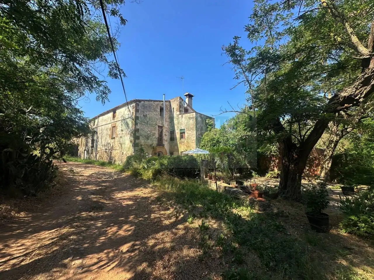 Casa rustica con giardino in vendita a Rupià