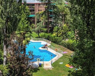 Swimming pool of Duplex for sale in  Madrid Capital  with Air Conditioner and Terrace