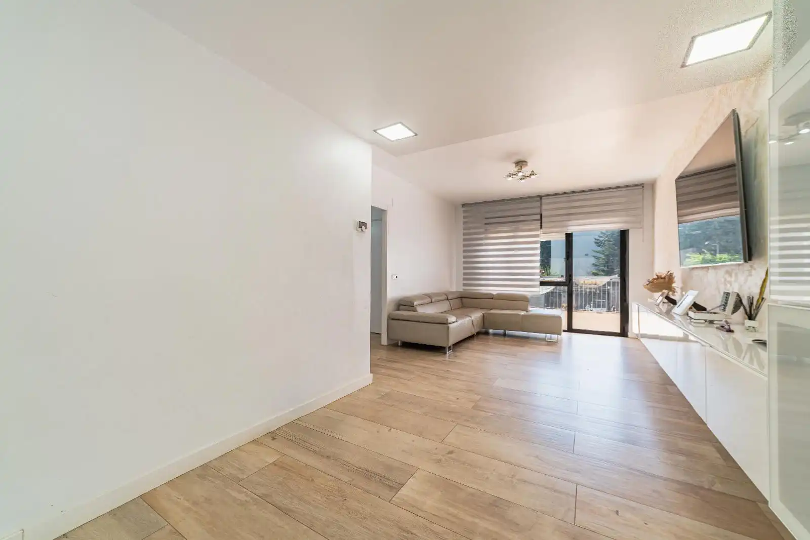 Wohnzimmer von Einfamilien-Reihenhaus zum Verkauf in Canet de Mar mit Klimaanlage, Heizung und Privatgarten