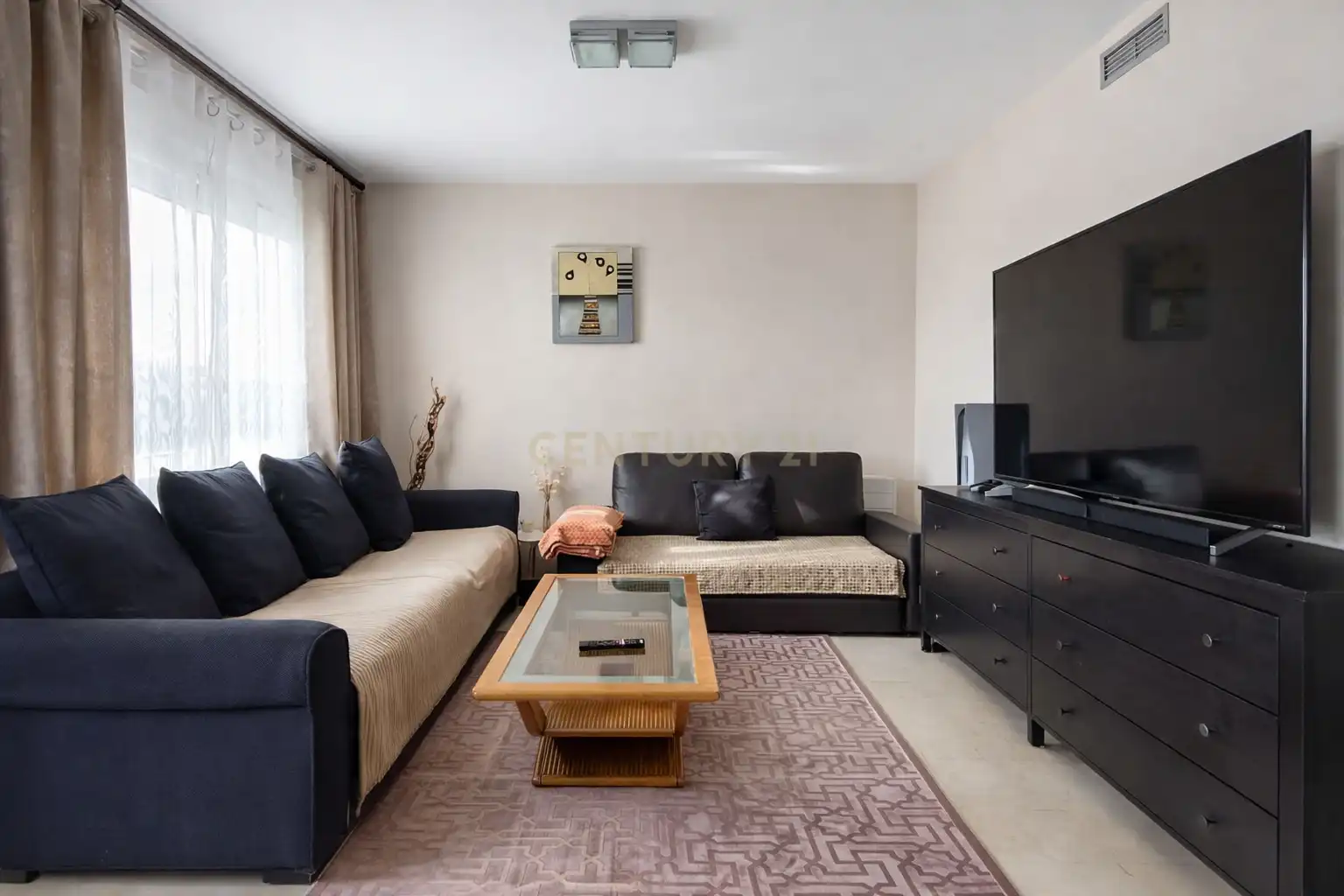 Sala de estar de Casa adosada en venta en La Nucia con Aire acondicionado, Trastero y Horno