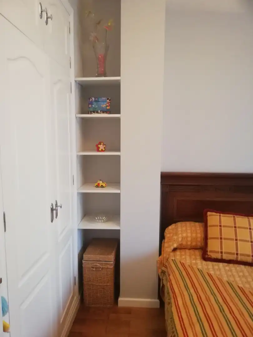 Schlafzimmer von Dachboden zur Miete in Huelva mit Klimaanlage, Terrasse und Möbliert