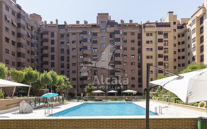 Swimming pool of Flat for sale in  Madrid Capital  with Heating, Private garden and Storage room