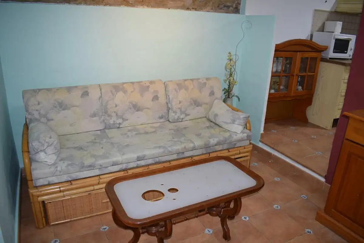Sala d'estar de Casa adosada en venda en Almuñécar amb Terrassa, Moblat i Microones