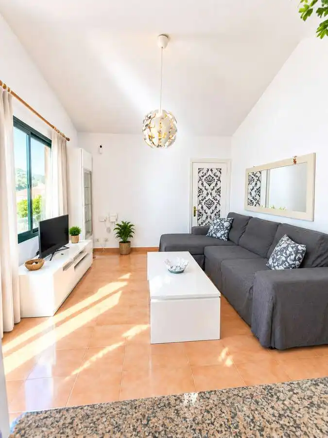 Sala d'estar de Casa o xalet en venda en Tías amb Moblat, Alarma i Piscina comunitària