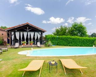 Swimming pool of Single-family semi-detached for sale in Sariego  with Heating and Terrace