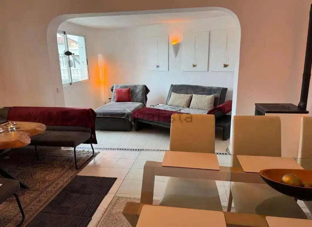 Sala d'estar de Casa adosada en venda en L'Alfàs del Pi