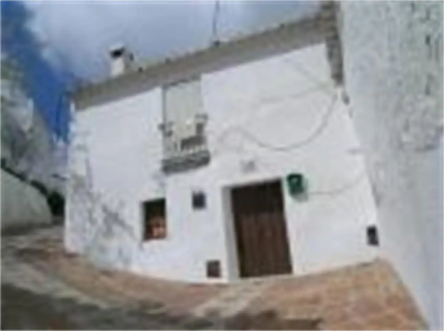 Vista exterior de Casa adosada en venda en Comares amb Balcó