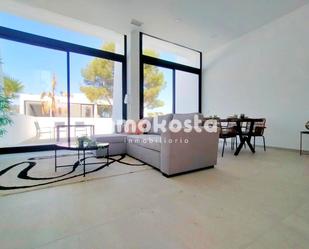 Sala d'estar de Casa adosada en venda en Calpe / Calp amb Jardí privat, Terrassa i Piscina comunitària