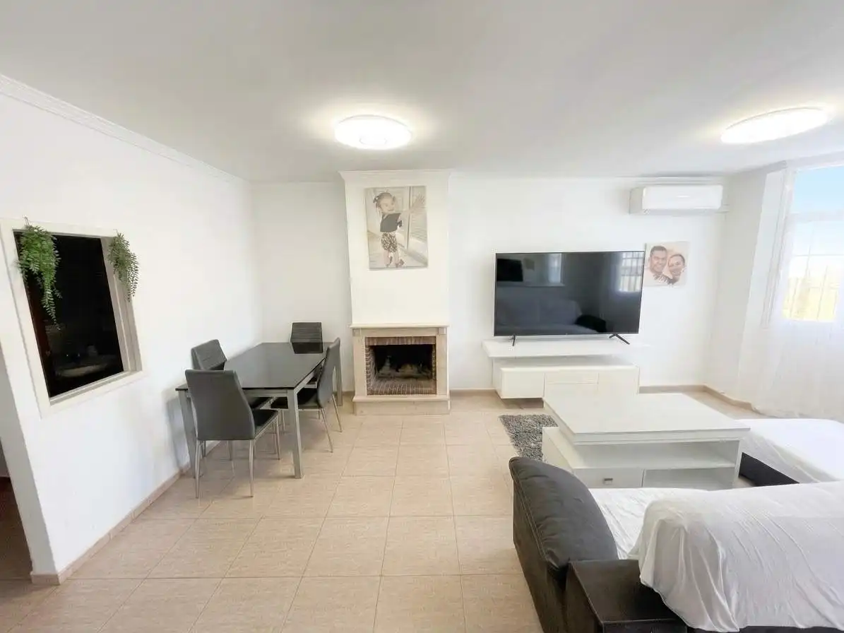 Sala d'estar de Casa adosada en venda en Vélez-Málaga