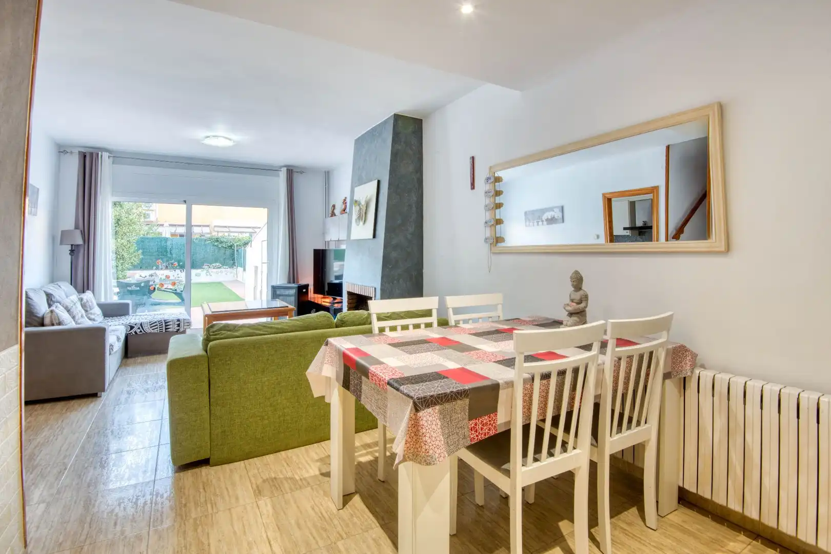 Sala de estar de Casa adosada en venta en Santa Cristina d'Aro con Calefacción, Jardín privado y Terraza