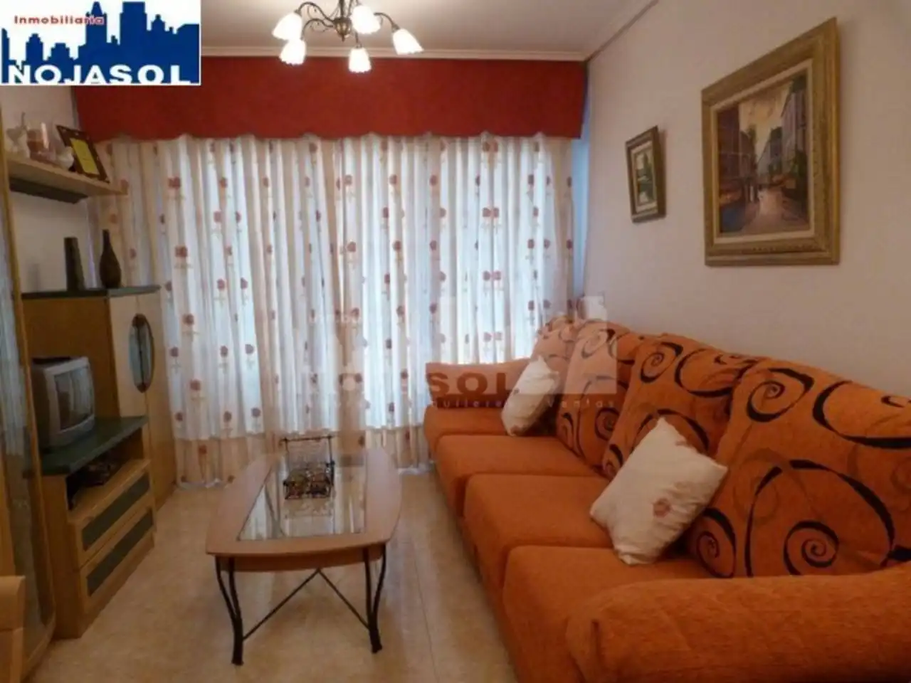 Sala d'estar de Apartament de lloguer en Noja amb Calefacció, Jardí privat i Terrassa