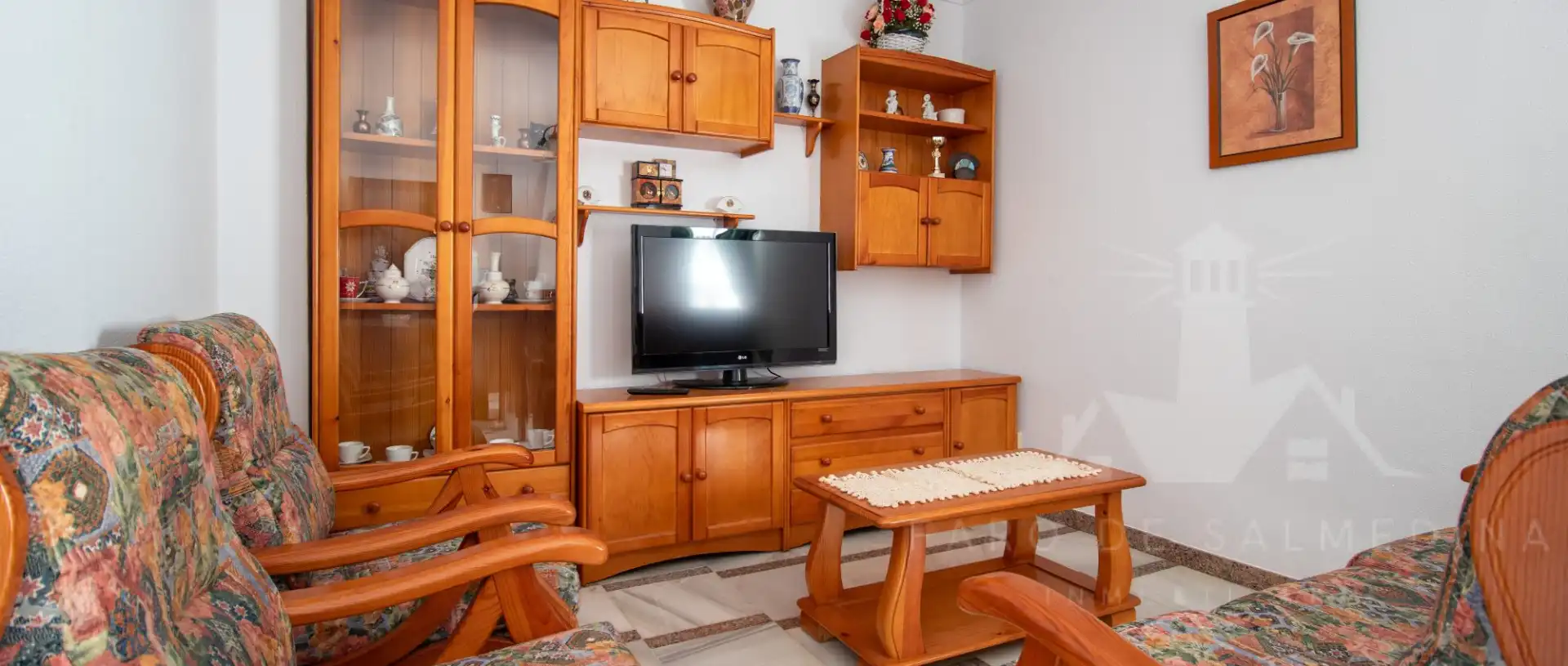 Sala de estar de Casa adosada en venta en Chipiona con Aire acondicionado, Trastero y Amueblado