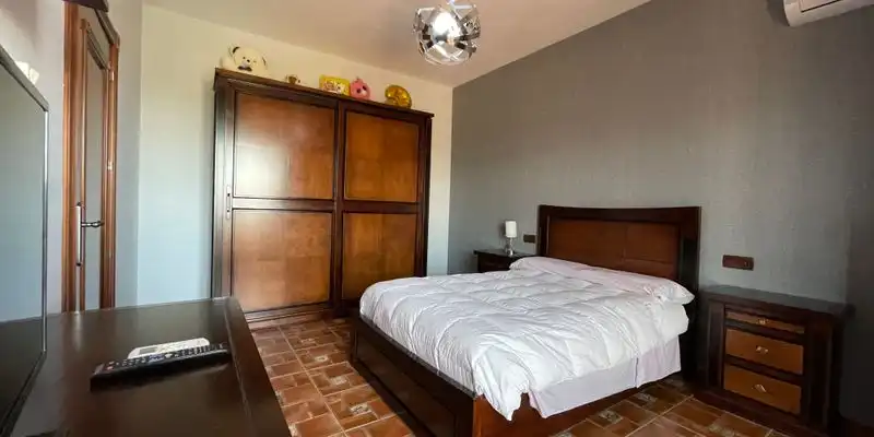 Dormitori de Casa o xalet en venda en Loja amb Aire condicionat, Jardí privat i Terrassa