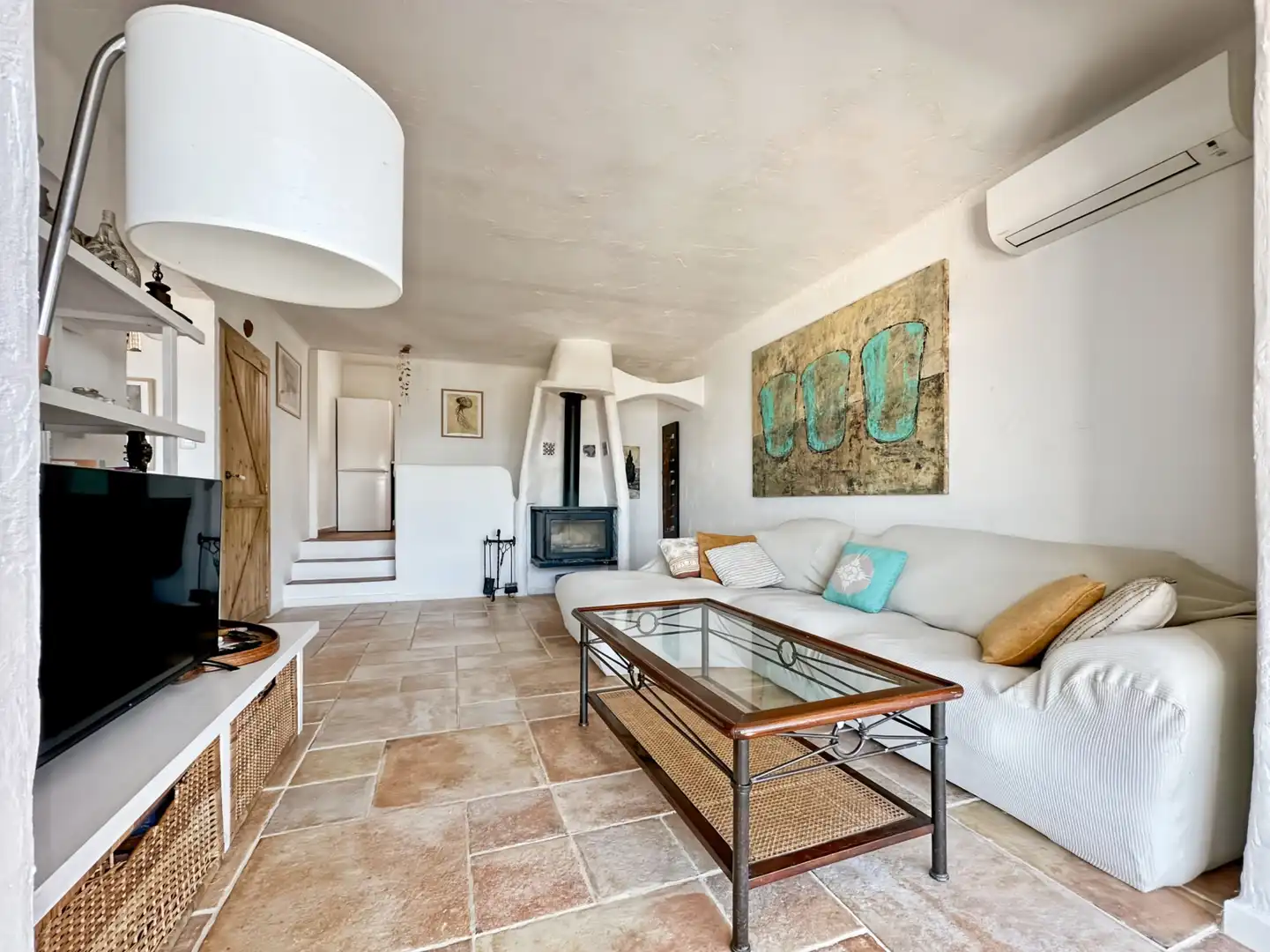 Sala d'estar de Casa adosada en venda en L'Escala amb Aire condicionat, Calefacció i Terrassa