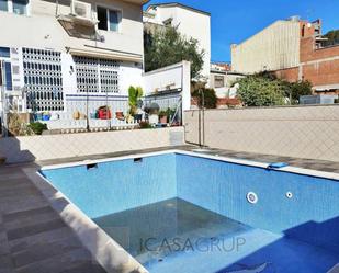 Swimming pool of Single-family semi-detached for sale in Rubí  with Air Conditioner, Terrace and Swimming Pool